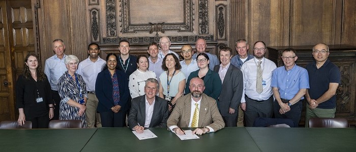 Teams from NHS Lanarkshire and UofG at the Strategic Partnership signing