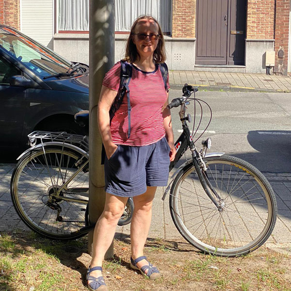 Caroline Booth (MA 1996) and bike ready to collect the day’s fresh bread products on a trip to Dunkerque.