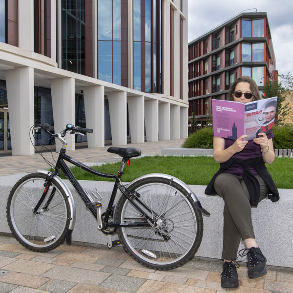 Avenue Editor and keen cyclist Jennifer Baird (MA 1996) enjoyed some absorbing reading material at the heart of our new Western campus.