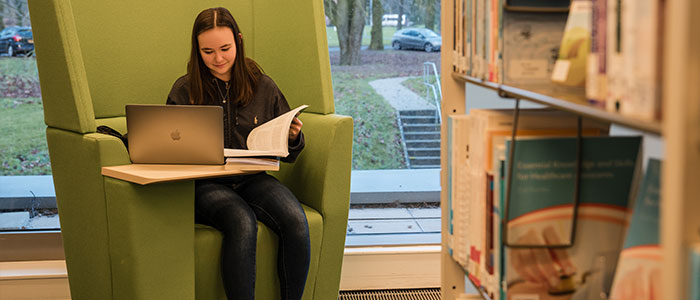 Student in Dumfries library