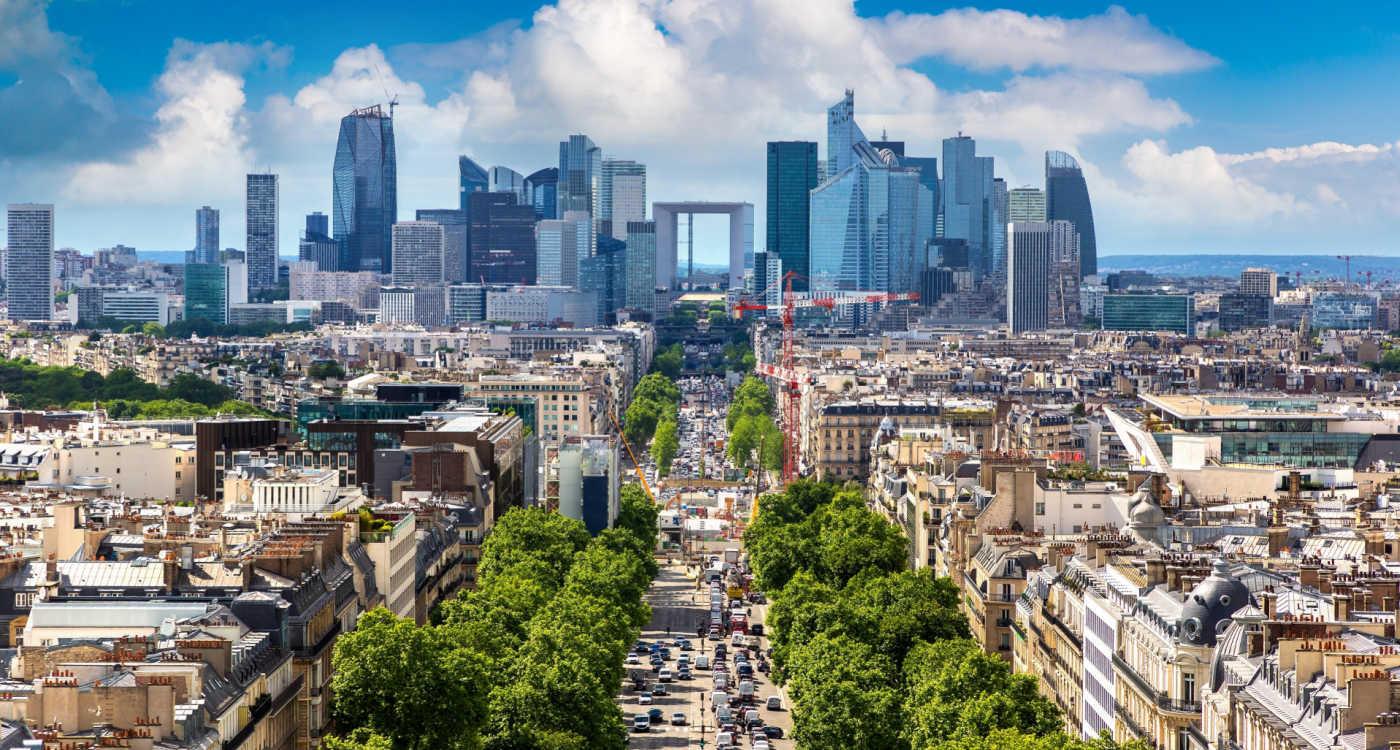 Panoramic aerial view of Paris and The Avenue Charles de Gaulle and business district of La Defence from Arc de Triomphe [Photo: Shutterstock]