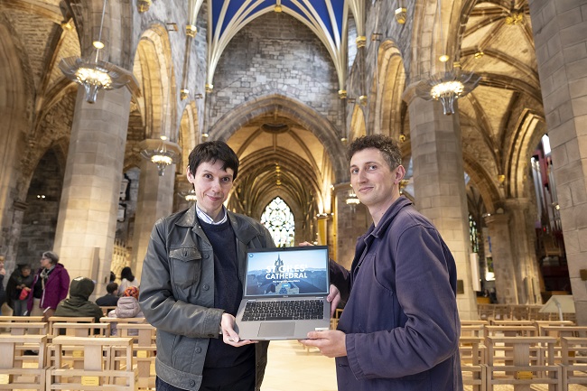 Left to right Dr Tim Peacock, Historian and Director of University of Glasgow Games and Gaming Lab; and Stephen Preston, Deputy Head of Heritage and Culture at St Giles’ Cathedral, help unveil the new historical video game launched for St Giles’ Cathedral’s 900th anniversary.