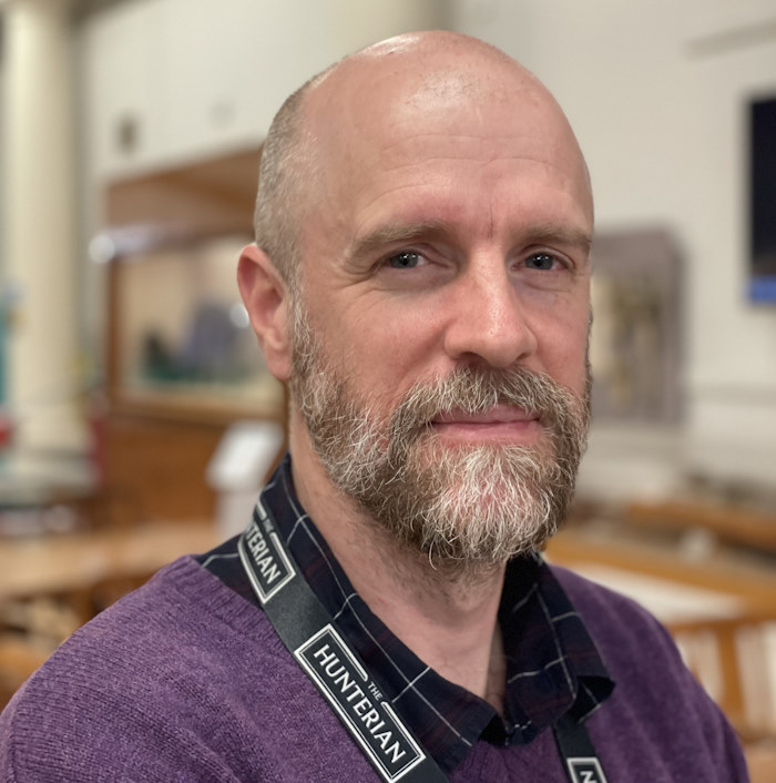 Photo of white male with bald head and beard