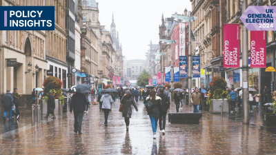 A rainy photo of Buchanan Street in Glasgow with text reading Policy Insights, UK General Election 2024