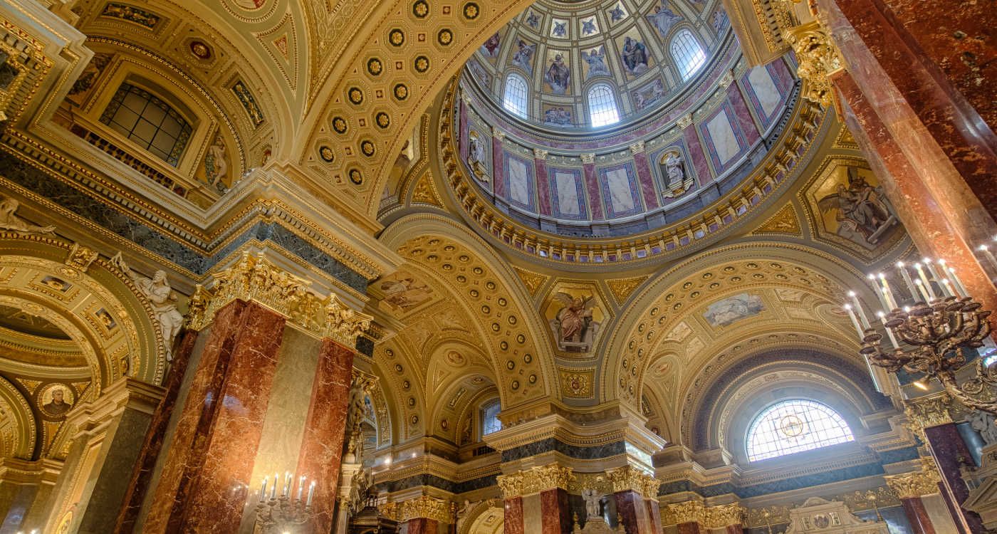 The interior decoration of St. Stephen's Basilica showing ornate domed ceilings [Photo: Shutterstock]