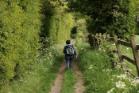 a young boy walking in nature