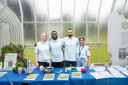 Photograph showing the members of group 4 with their activity table.