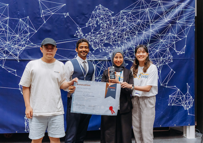 A photo of four of the members of the SensUs team (l-r) Zihao Pan, Farid Bahada, Tasneem Khodair, and Najaree Janjerdsak.