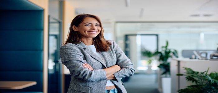 women smiling in office setting