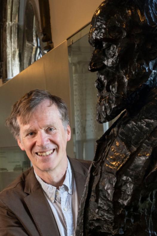 Professor Miles Padgett and a bust of Lord Kelvin