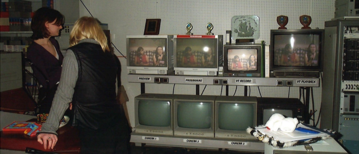 Photo of students of GUST gathered around CRT monitors