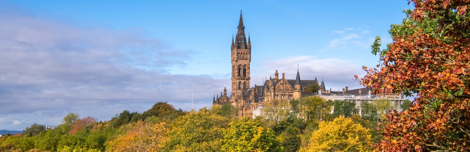 The Gilbert Scott Building seen from Kelvingrove Park in Autumn