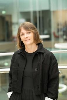 A photo of Rachel, taken in the atrium at the ARC