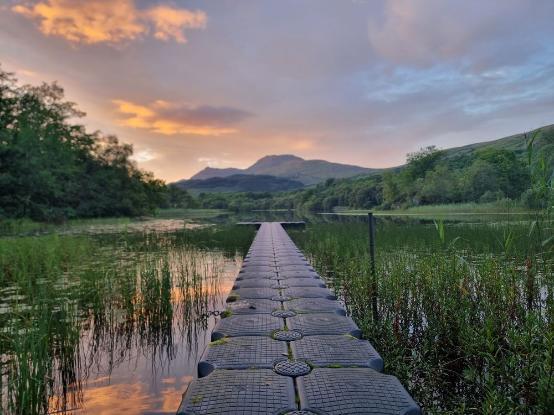 An evening view of a small Scottish lake