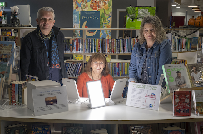 Professor Hayden Lorimer of the University of Edinburgh, Wintering Well box user Claire Charlwood, and Professor Hester Parr of the University of Glasgow are pictured in Kirkintilloch’s William Patrick library