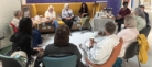 Group of people sitting in circle in Byres Community Hub