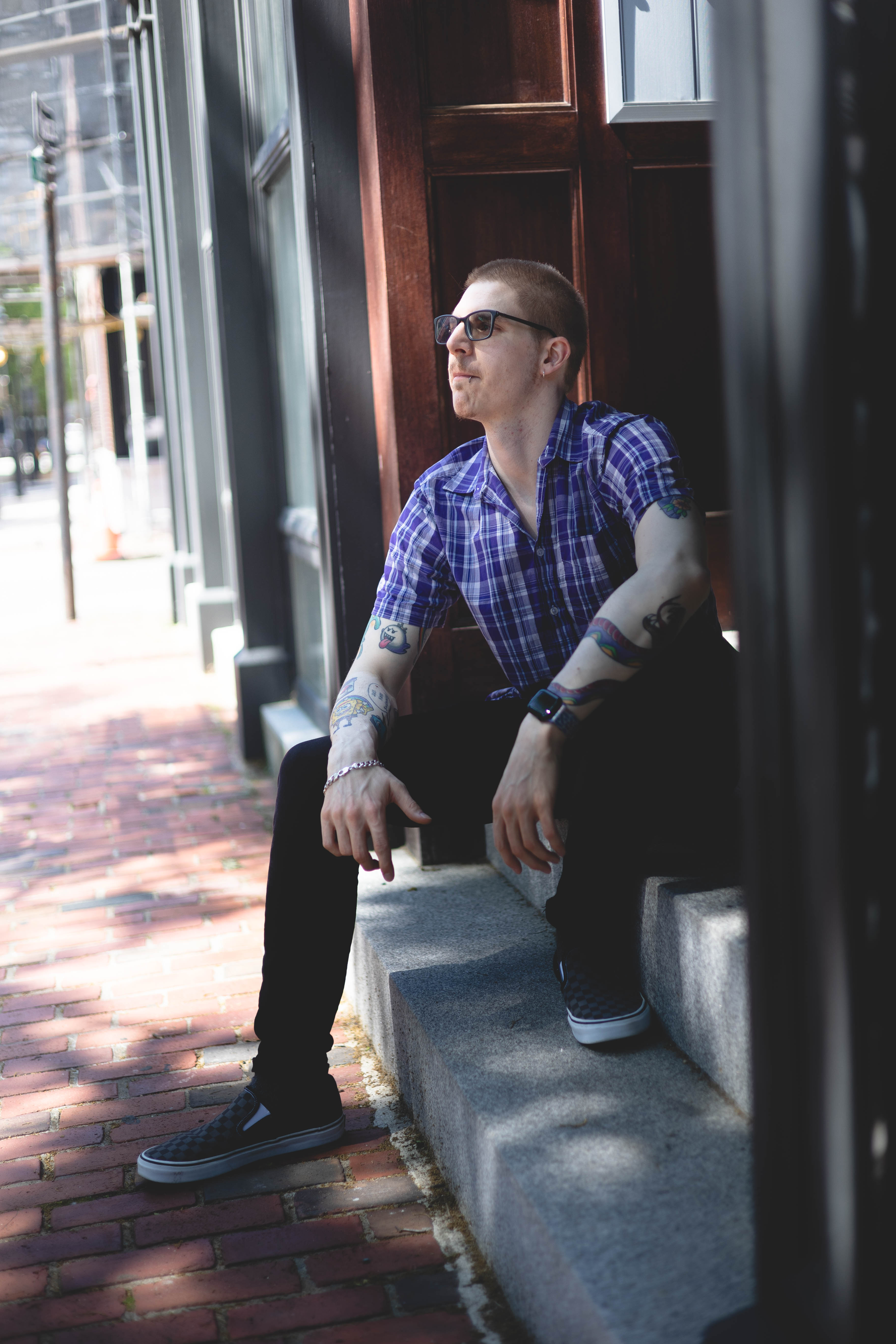 Ryan Field sitting on a step in boston