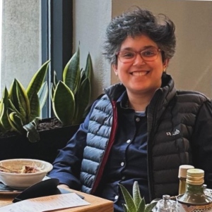 Durga Nagarajan sitting in a restaurant