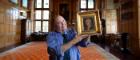 Professor Gerard Carruthers at Barnbougle Castle with the portrait of Robert Fergusson. The newly discovered 18th century portrait of Fergusson is part of the collection of former 19th Century Prime Minister, Archibald Primrose, 5th Earl of Rosebery, 1st Earl of Midlothian, who was a keen collector, historian and writer. Credit Martin Shields