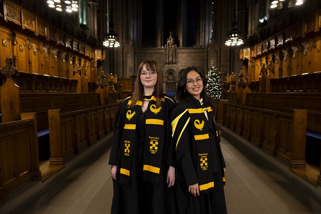 Pictured in the University of Glasgow Chapel L to R Reparatory Justice Masters students Fanny Olsson and Fer Ortiz Vivas