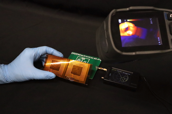 A photo of the device prototype with a thermal camera