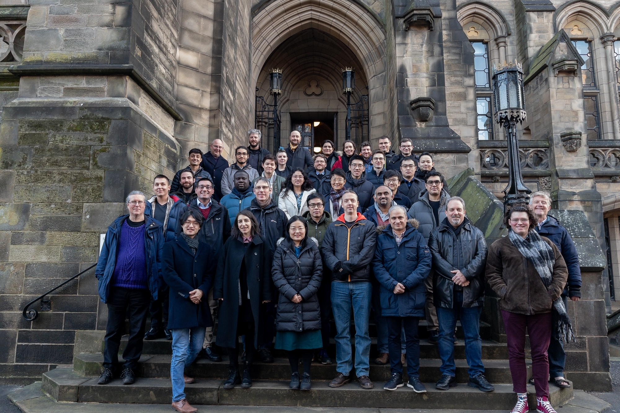 Members of the Glasgow Systems Section in front of a University building