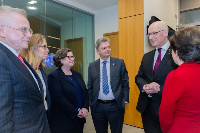 L to right UofG's Professor Murray Pittock;Dr Mateja Peter, Executive Director of SCGA; University of Edinburgh Provost Professor Kim Graham; UofG Principal Professor Sir Anton Muscatelli; First Minister John Swinney and St Andrews Principal  Professor Dame Sally Mapstone