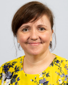 A head and shoulders portrait of Professor Emma Thomson