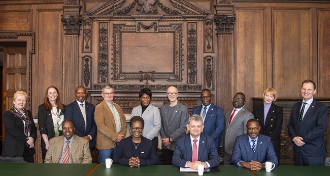 Representatives from Kamuzu University of Health Science Graeme Dey, Scottish Government Minister for Higher and Further Educations (KUHeS) join University of Glasgow senior team and