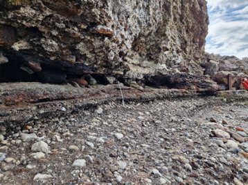 coastal cliff and foreshore composed of slag