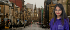 View down a street in Glasgow with headshot of smiling woman