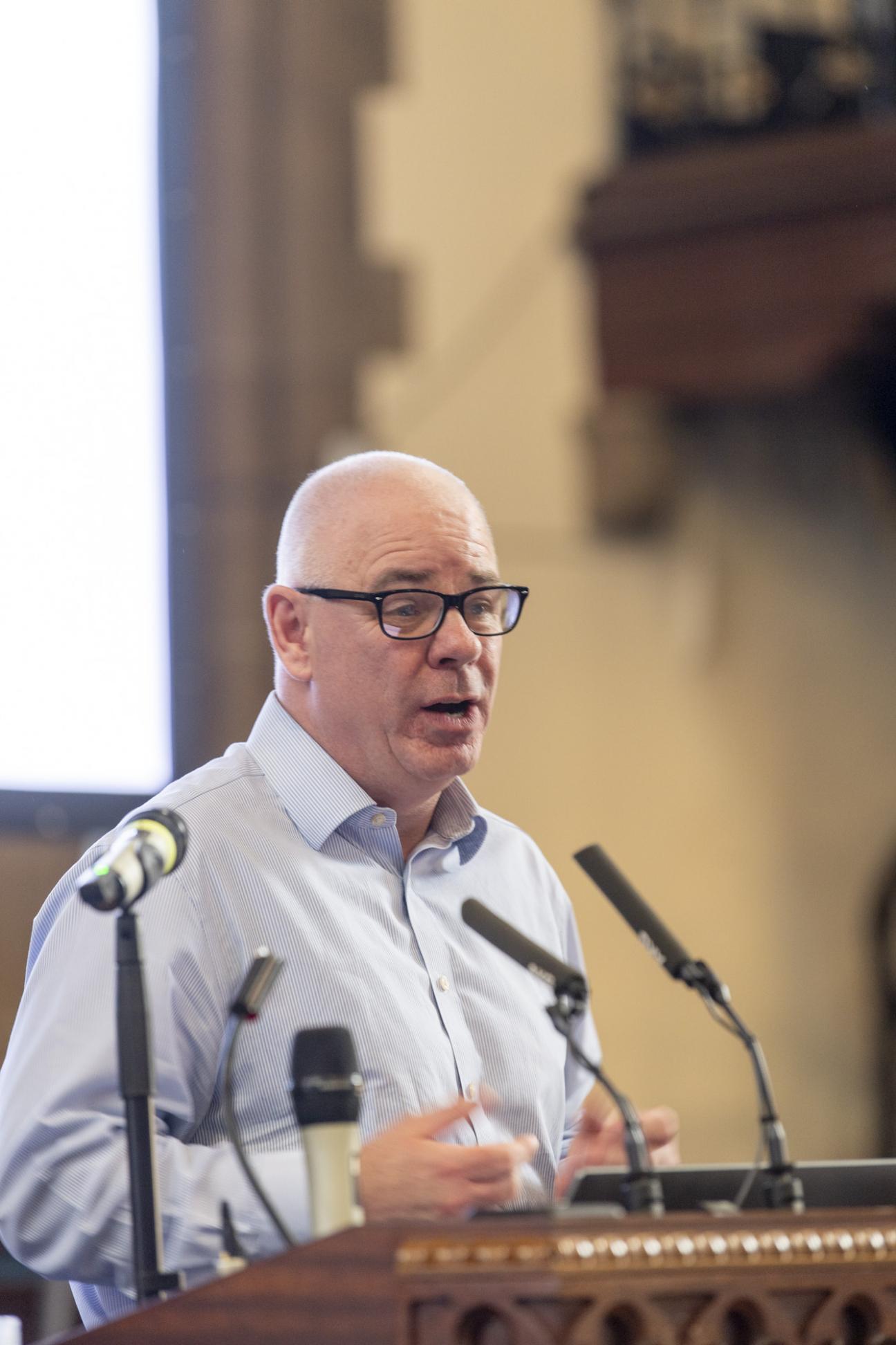 person speaking on stage