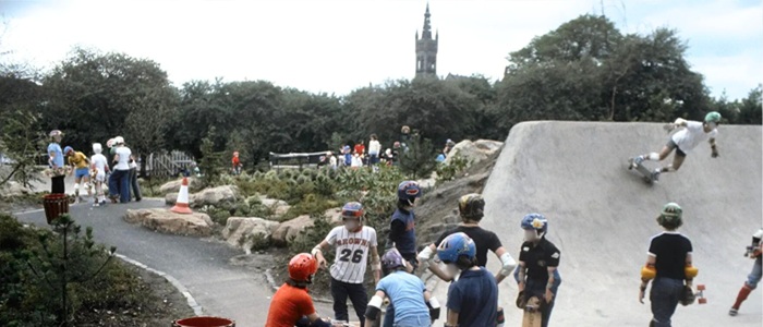 Young people in 1978 wearing helmets and other safety gear skateboarding at Kelvin Wheelies skatepark. Credit Iain Urquhart with kind permission from North Skateboard magazine