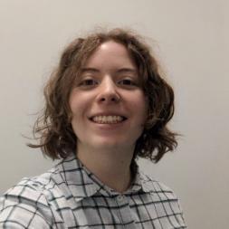 A picture of Freya Whiteford wearing a light chequered shirt.