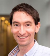 A head and shoulders portrait shot of Chris Mahony