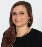 A head and shoulders portrait shot of Dr Cecilia Ansalone