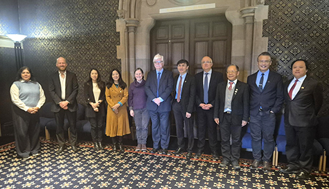 Group image of NTNU and UOG staff in the main building