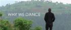 A man stands on a hill overlooking the Rwandan countryside. A screenshot from the film Why We Dance