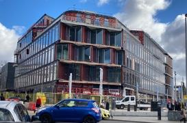 Clarice Pears building from Byres road red frame glass frontage