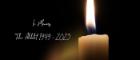 Photo of a lit candle next to text reading: In Memory Tekie Alibekit 1949-2023